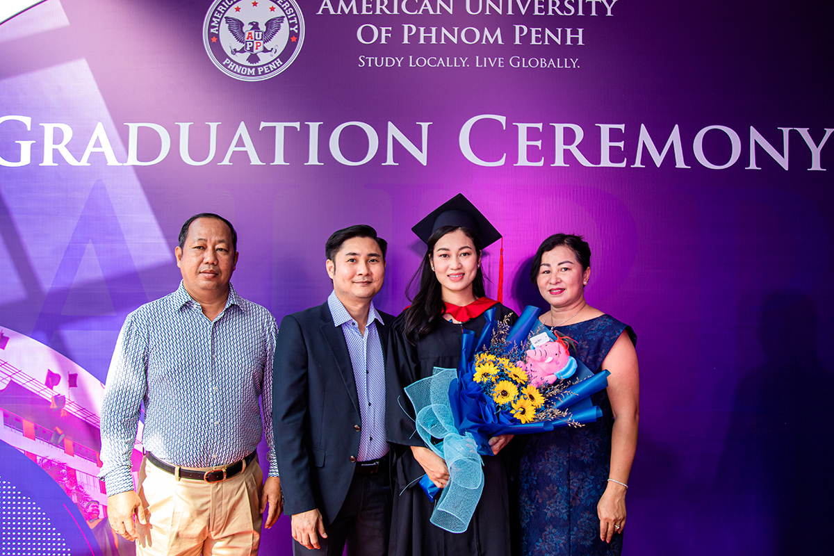 Family with graduate at the Uarizona AUPP Graduation Ceremony June 2022