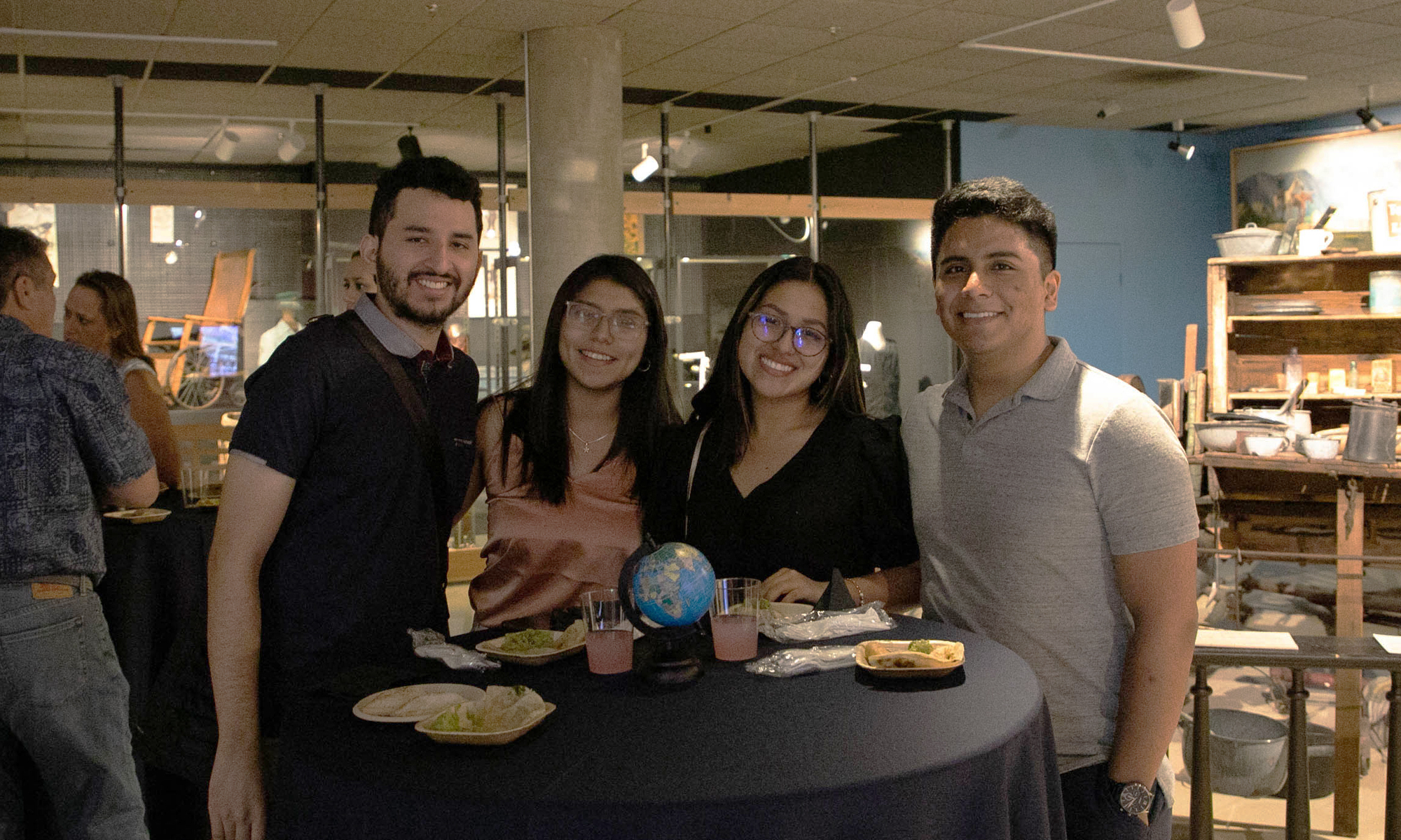 UArizona Intl Students Visitors Reception 5-11-22 - two male and two female guests at table