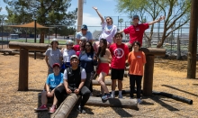 Twelve of the fifteen new 2022-23 Global Ambassadors at a team-building ropes course