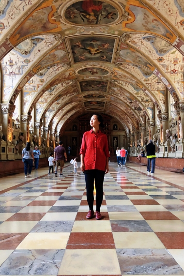 Mandy Han, studying abroad in Munich, Germany, standing in museum hallway