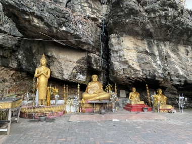 UA Study Abroad Student Reina Salgado took this photo of large golden Buddhas against a rocky cliff, on her GEL program in Southeast Asia.