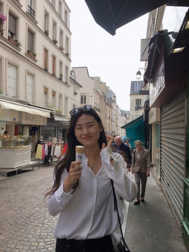 UA Study Abroad Student Stephanie Kim eating an ice cream cone in Paris. UA Study Abroad Student Stephanie Kim eating an ice cream cone in Paris.