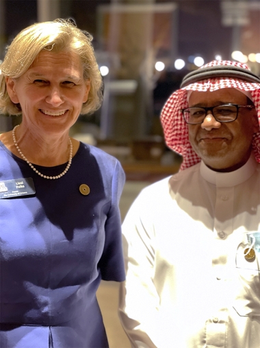 Provost Folks with alum at the reception in Dubai, UAE, March 2022